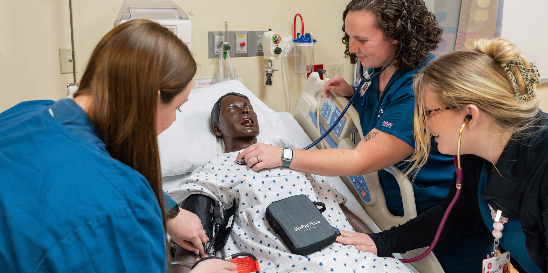 Students practice with manikins